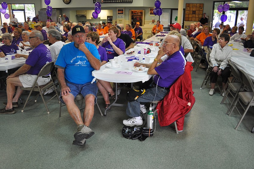 Cancer survivors listened to testimonials before the walk.