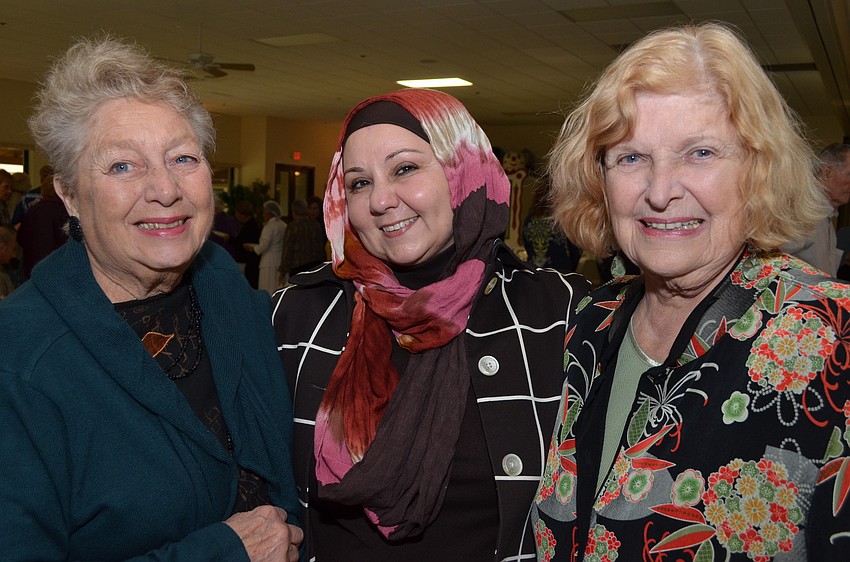 Nasareen Sawaf and Pat Dever met each other at the Feast of Abraham 10 years ago and have stayed friends since. They embrace each other after not seeing each other in a long time.