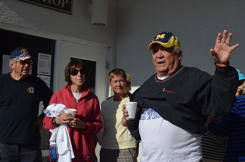 Dick Neaves gives his neighbors directions and thanks everyone for attending.
