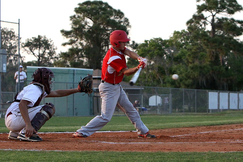 Cardinal Mooneyâ€™s Flynn Angly, No. 18, goes to swing at the ball.