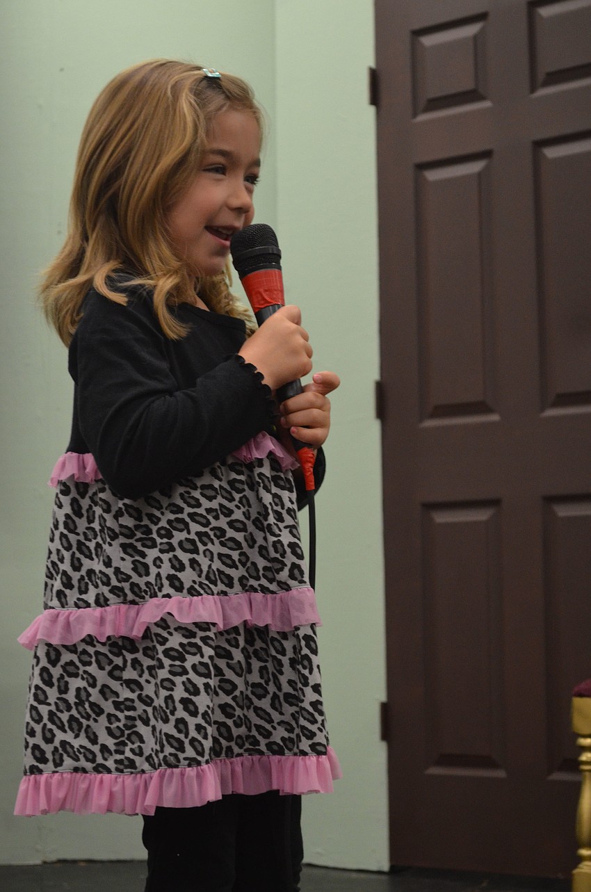 Preschooler Summer Schulz tells fellow students and grandparents why she loves her grandparents.
