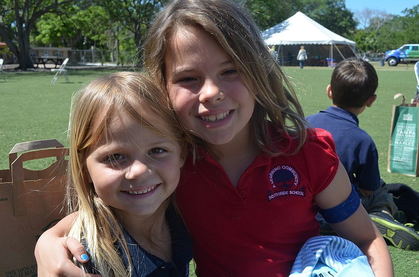 Maisey Tulla and Alyssa Warren listen to a presentation from Spanish Point.