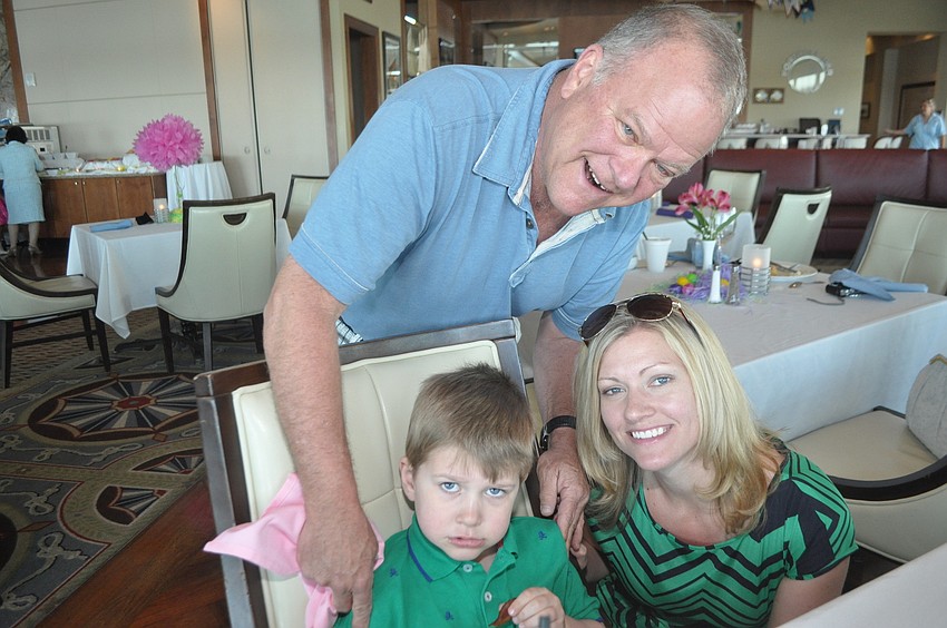 Jim Dickerson with Braydon, 4, and Brenna Hildebrand