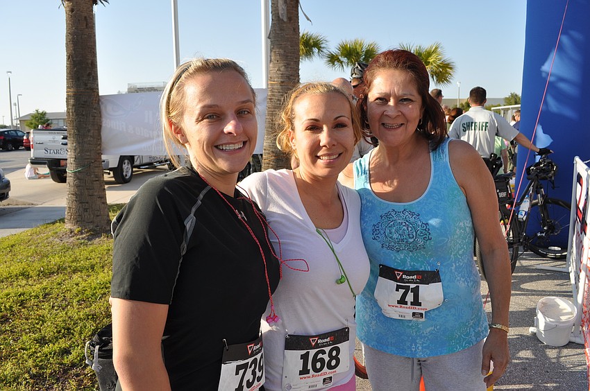 KT Arnold, Deanna Tabachnick and Betsy Jimenez of Child Protective Services vowed to run their best.