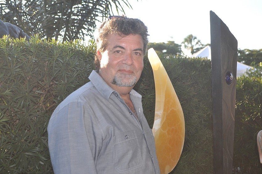 Scot Buccina creates abstract, figurative and marine stone sculptures.