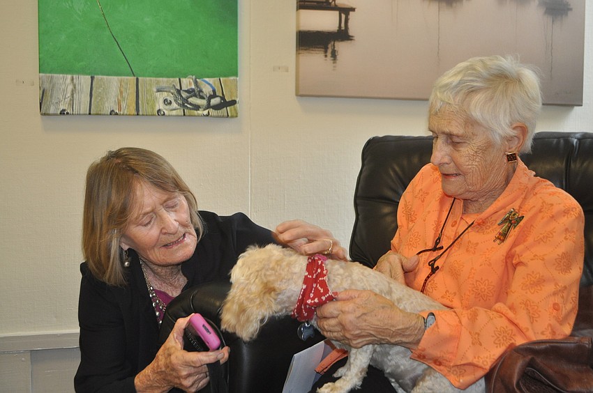 Bobbie Banan and her poodle, Pumpkin, with Dora Walters