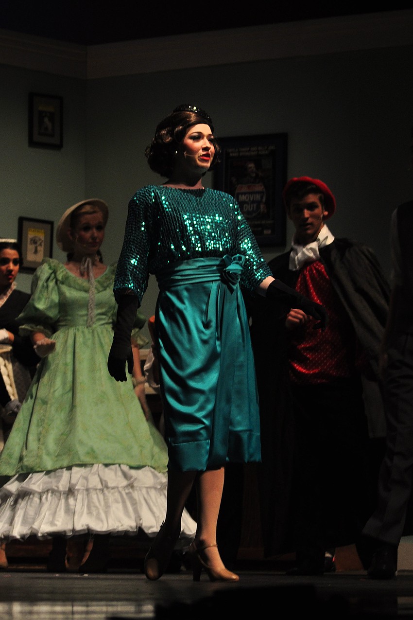 Channing Weir, portraying lead femal Janet Van De Graaff, takes her introduction in the play.