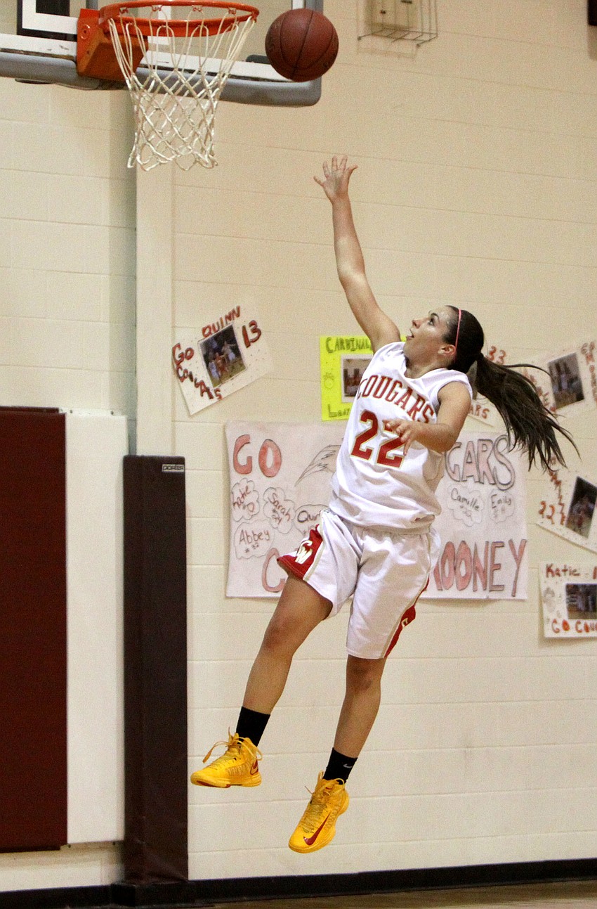 Cardinal Mooneyâ€™s Camille Giardina, No. 22, shoots a lay up.