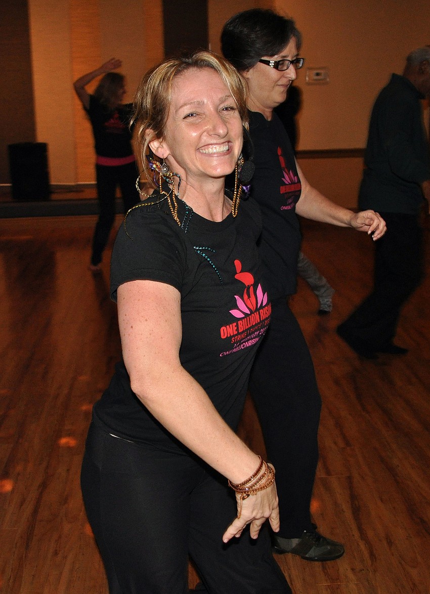 Kelly Atkins led people at the dancing event Thursday, Feb. 14, at the Knights of Columbus.