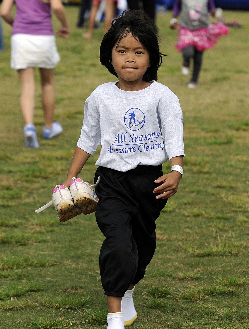 Five-year-old Kara Schumwayâ€™s favorite part of T-ball is batting.