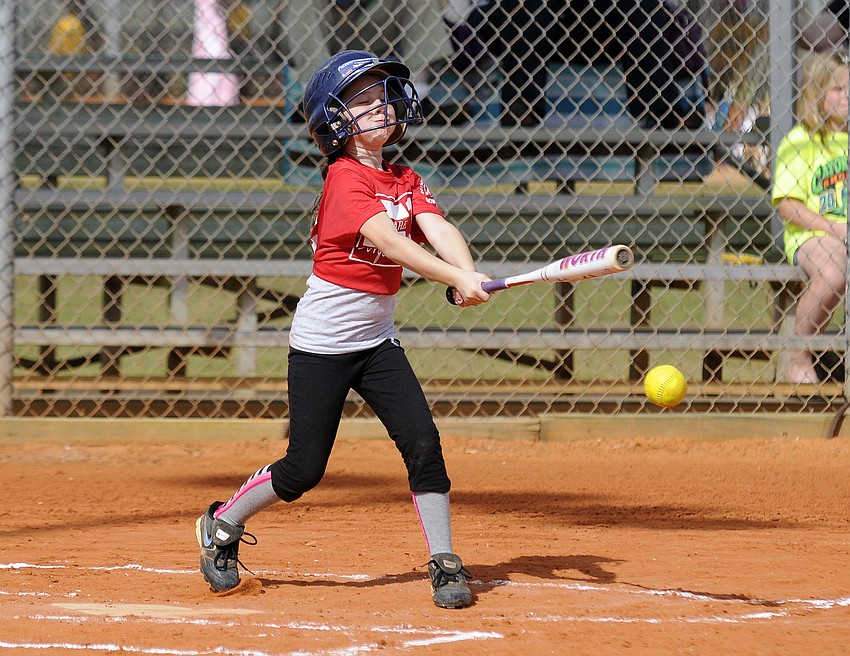 Eight-year-old Taylor Clarke notches a hit for Square 1 Burger.