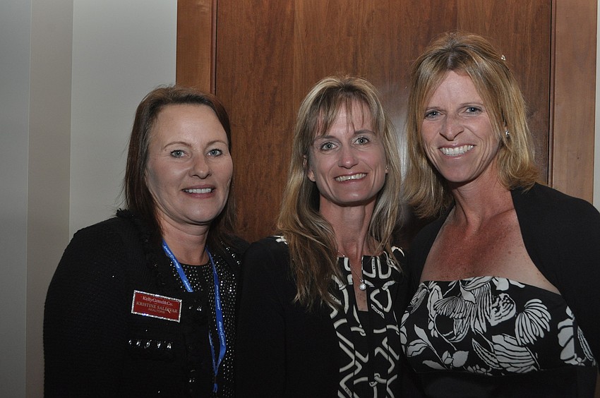 Kristine Saldivar, of Take Stock In Children Manatee County, with Candice McLeod and Lisa Bechtold of Take Stock in Children Sarasota County