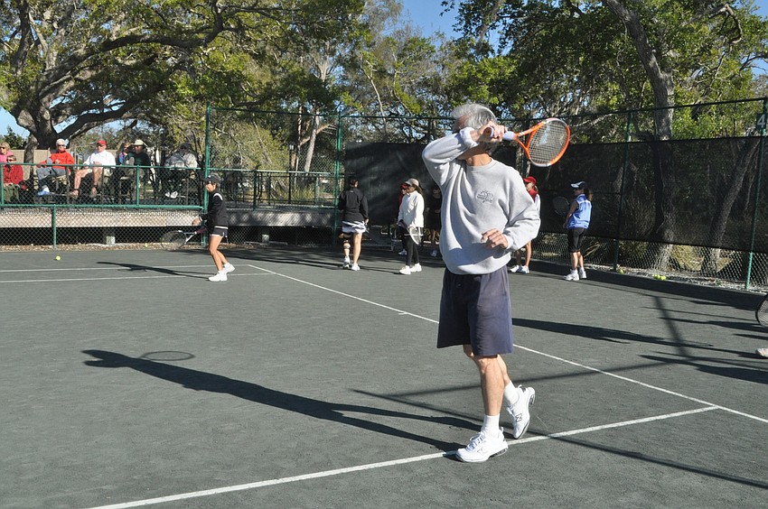 Jim Pappas follows through on his forehand.