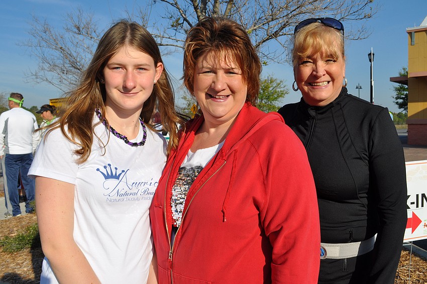 Bailey and Tracie Morris and Jeanne Wonning walked with Team 