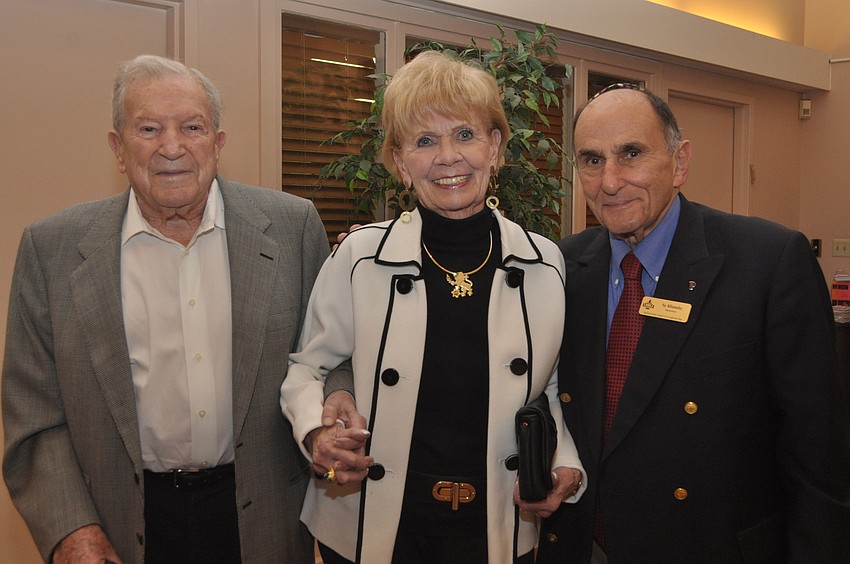 Sam and Sally Shapiro with Sy Klionsky, temple president