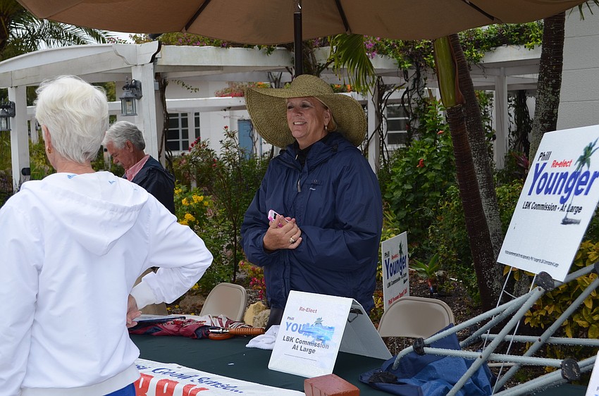 Key resident B.J. Webb urges residents to vote for the incumbents Tuesday at Longboat Island Chapel.