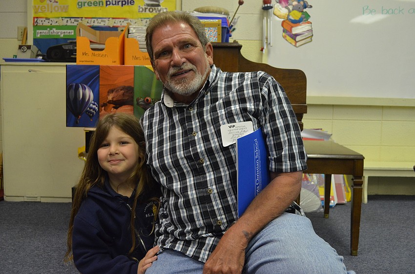 Atalysse McHugh with her grandpa Tony Dagostino.