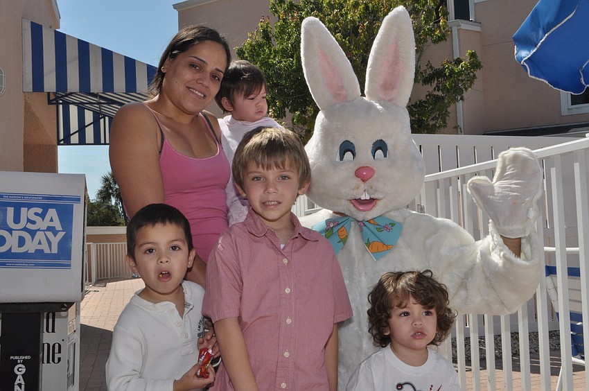 front, Yago Cisnero, 4, Xavier Edmoundson, 2, back, Annette Coletti with Mayde Cisnero, 1