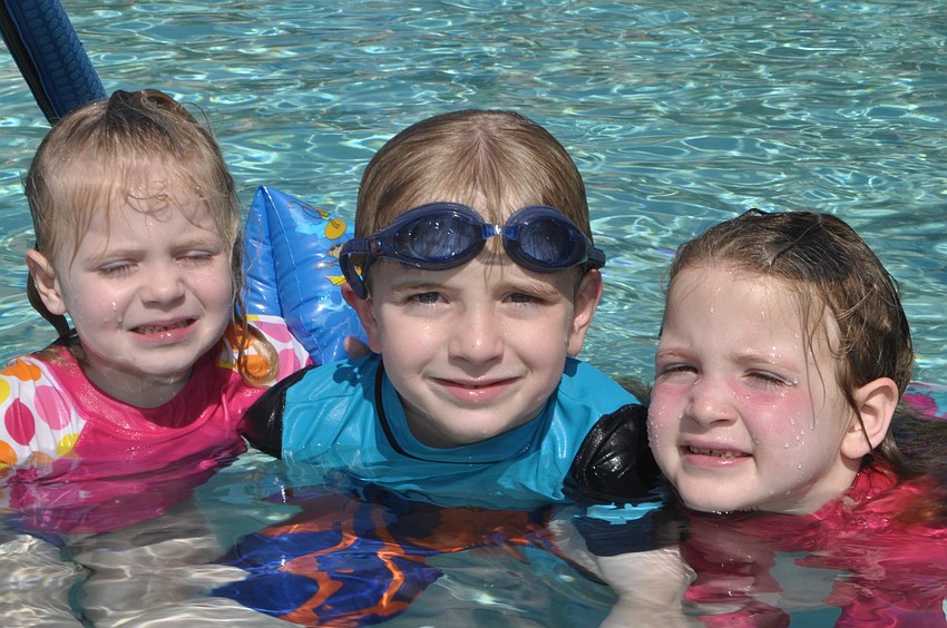 Kate, 3, Thomas, 8, and Abby Weldon, 6