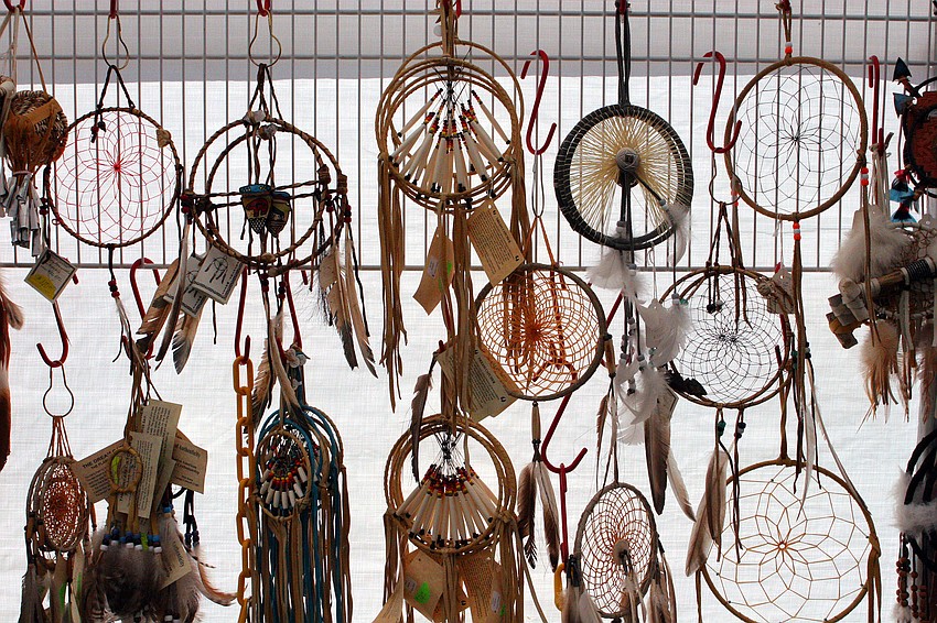 A display of dream catchers inside one of the many tents set up at the Native American Indian Festival at the Sarasota Fairgrounds.