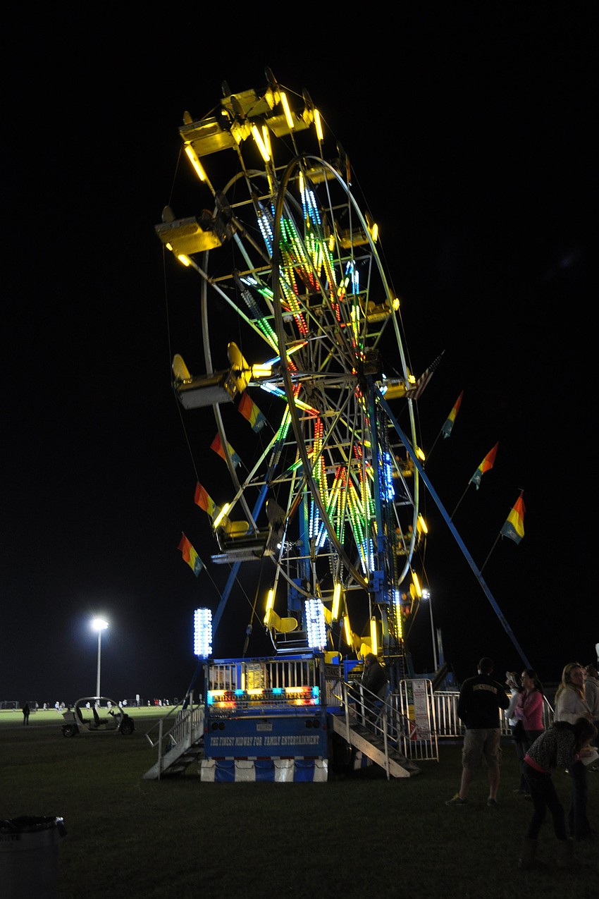 Guests can enjoy the Ferris wheel and other attractions.