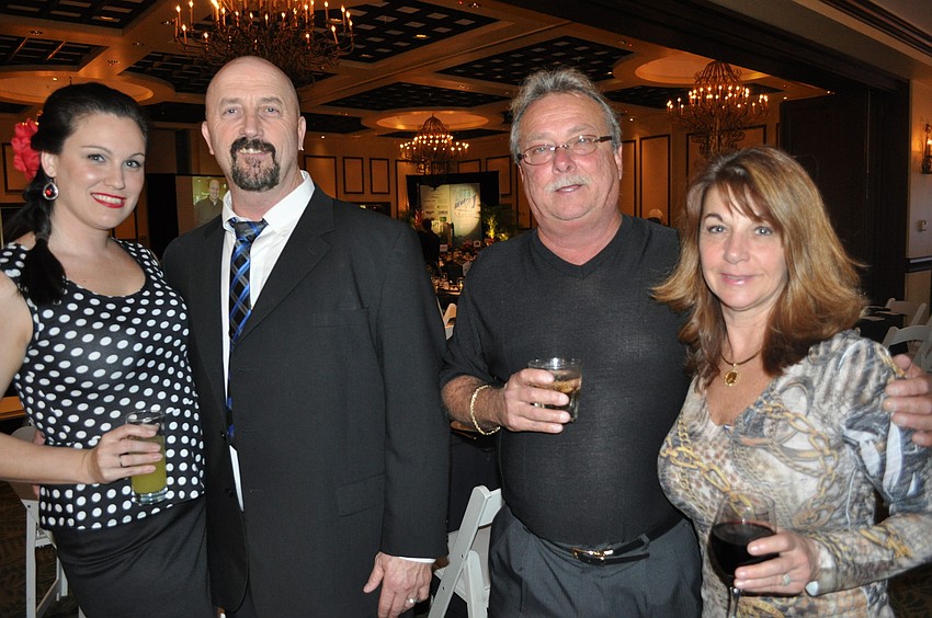 Waste Proâ€™s Jennifer and Andy Toller and Bob and Jaye-Lynn Baubilitz
