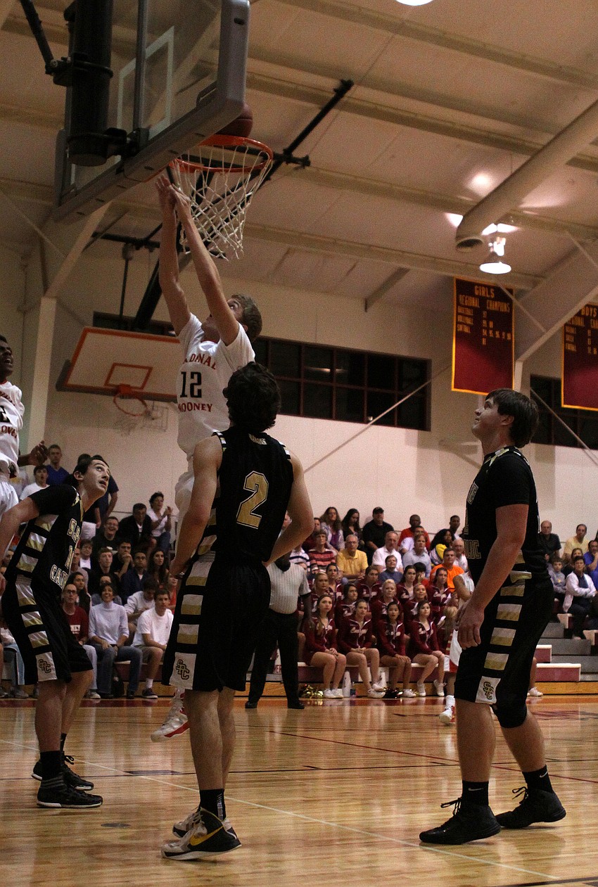 Cardinal Mooneyâ€™s Matt Hueston, No. 12, scores for Cardinal Mooney.
