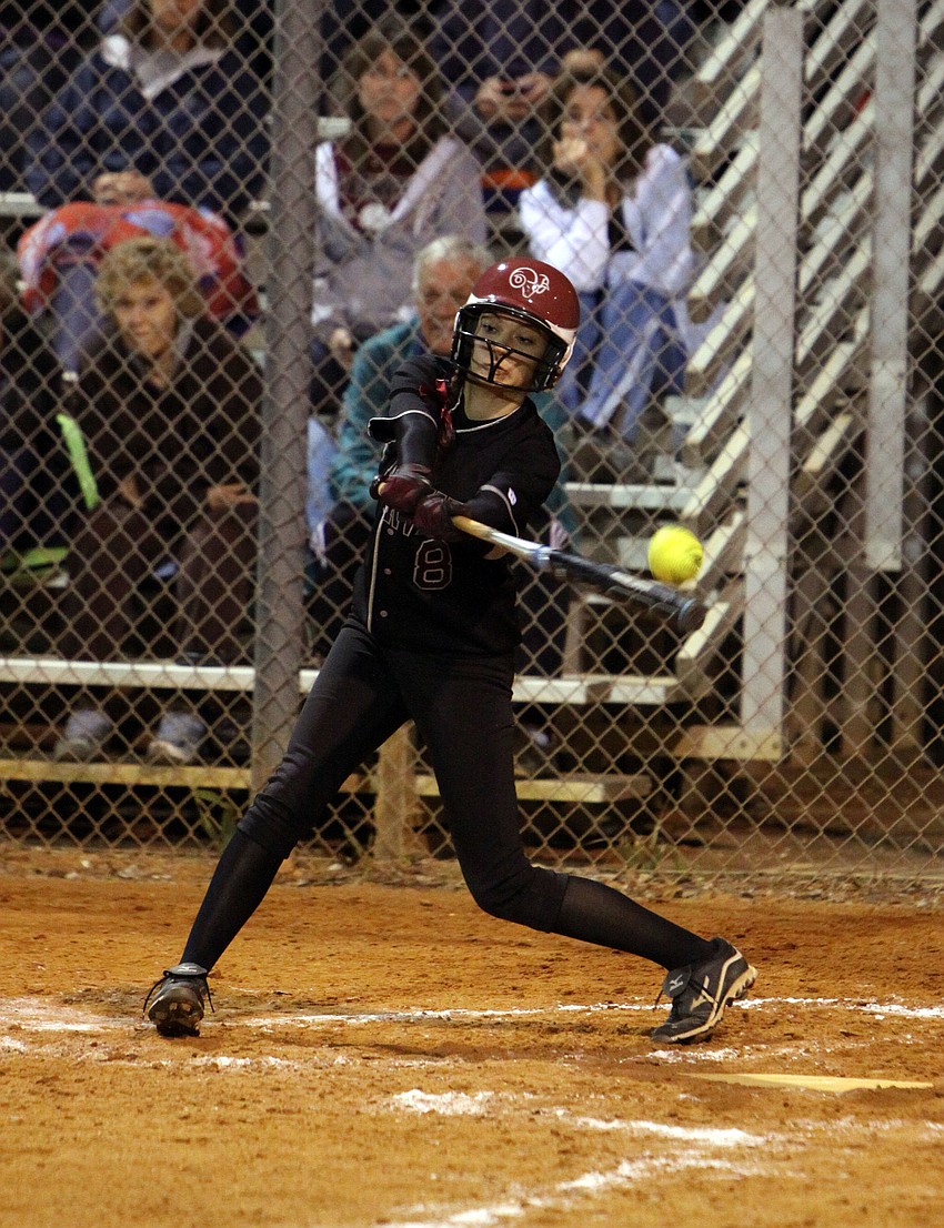 Riverviewâ€™s Stephanie Kouvatsos, No. 8, makes contact with the ball and her bat.