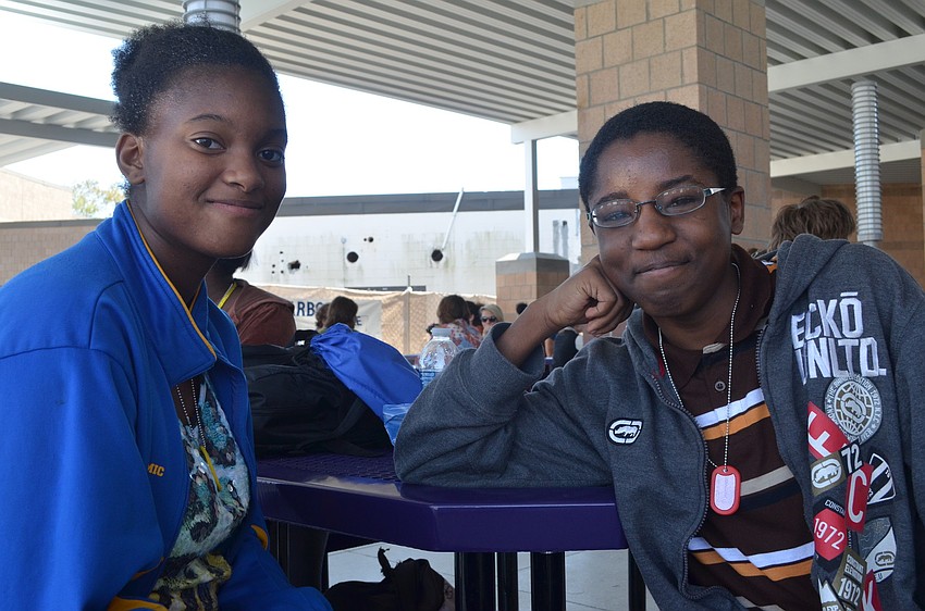 Freshmen Daisha Simpson and Erik Waiters enjoy the celebration of their achievements.