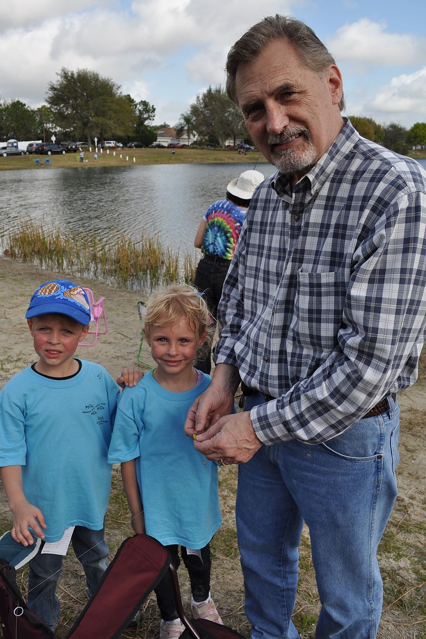 Michael and Michelle Wagner received fishing help from their dad, Skip.