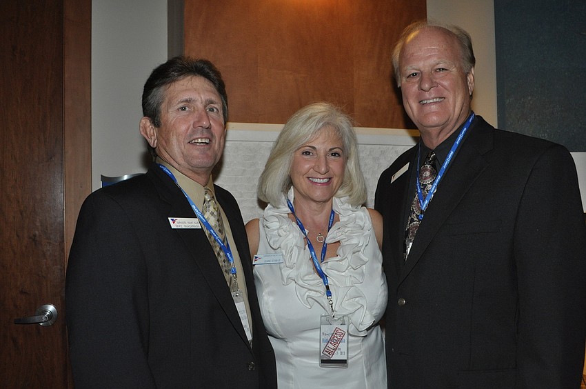 Sarasota Yacht Club Charitable Foundation board members Mike McAdaragh, Diane Stabile and Frank Wright