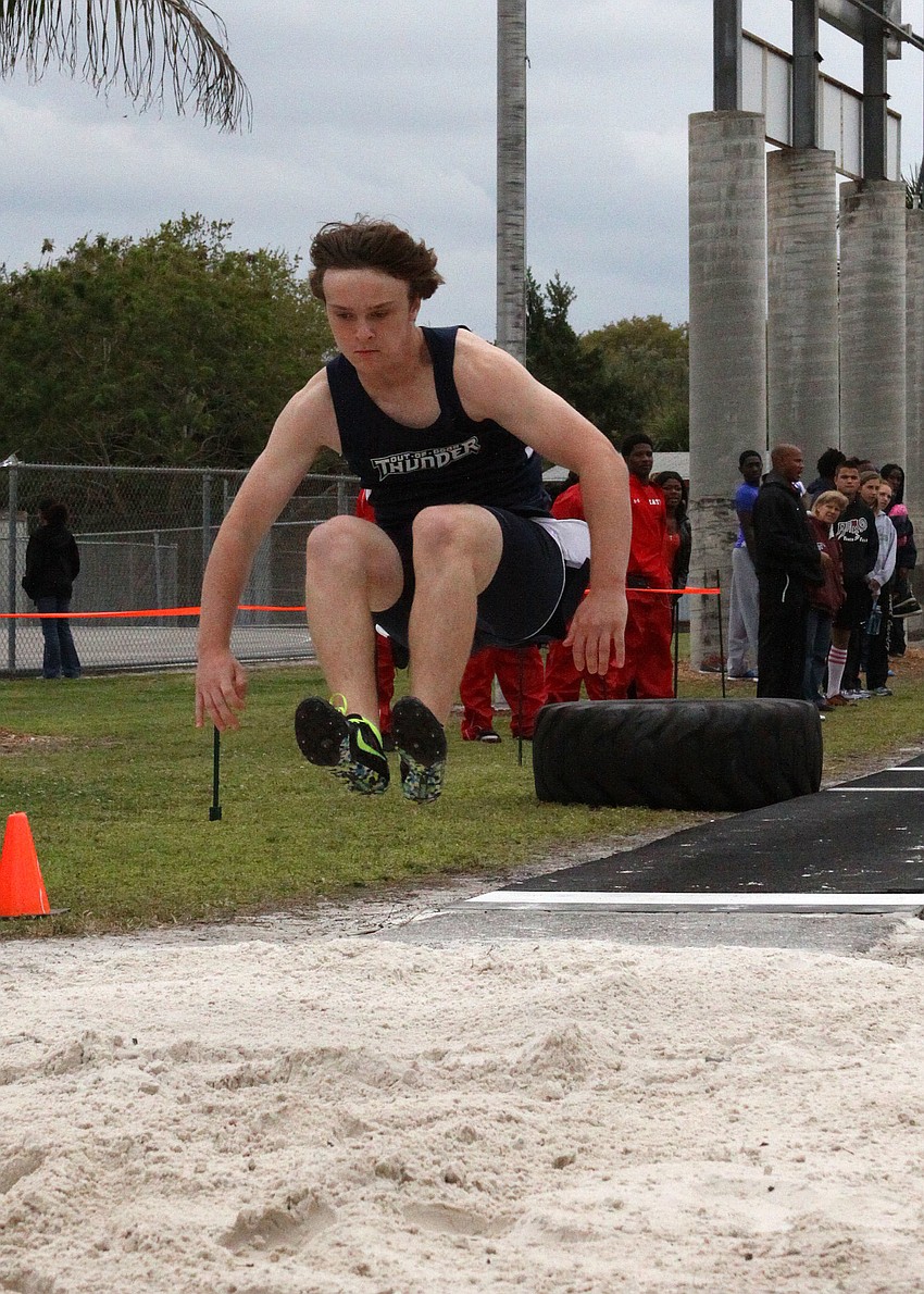 Chris Poole, freshman, participating the long jump for the Out-of-Door Academy.