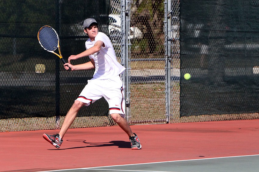 Sarasotaâ€™s Eric Scarlett prepares for a forehand shot.