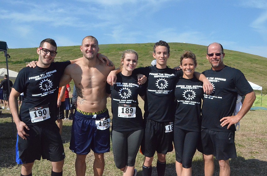 Volunteers and runners Bryan Karp, Jason Koczman, Carlton Aurelius, Madison Plank, Jessica Aurelius and Dean Aurelius