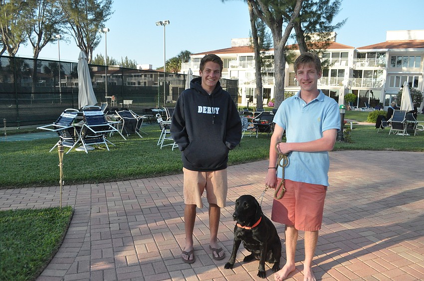 Sam and Ben Cook with their dog, Kate