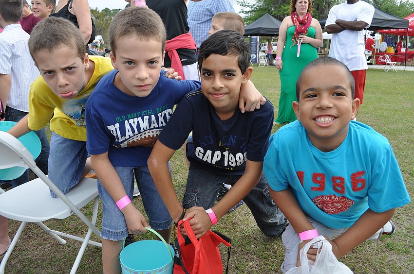Twins Nicholas and Keith Stansell, Suvan Sethi and Noah Cummings put on their game faces for the egg hunt.