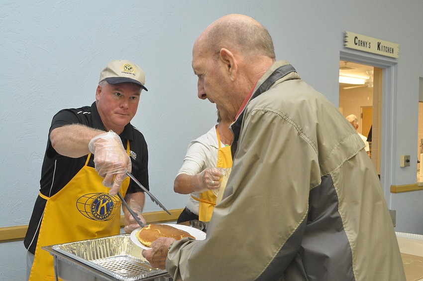 Jack Brill serves Rick Williams
