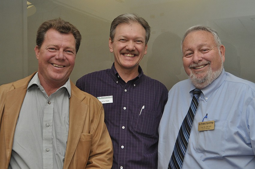 David Thompson and Jack Dean of G. Fried Flooring with Larry Hale, center, of Hale-Edwards Associates