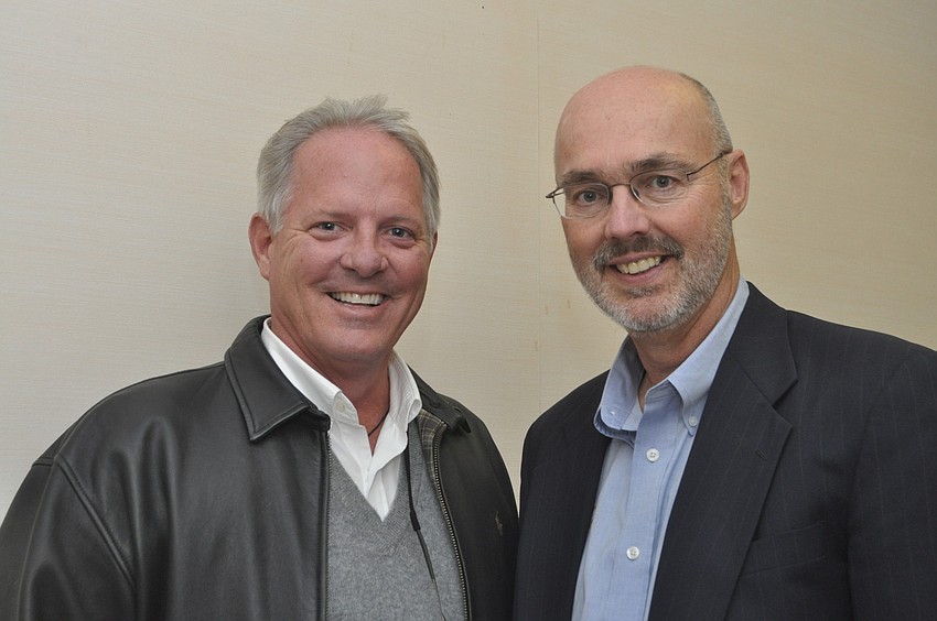 Michael Drake of Property Solutions Group with Town Manager Dave Bullock