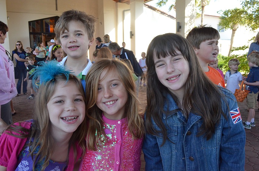 Ella Rochester gets ready to find some eggs with her brother Reece, Maura Ryan and Faith Hutchinson.