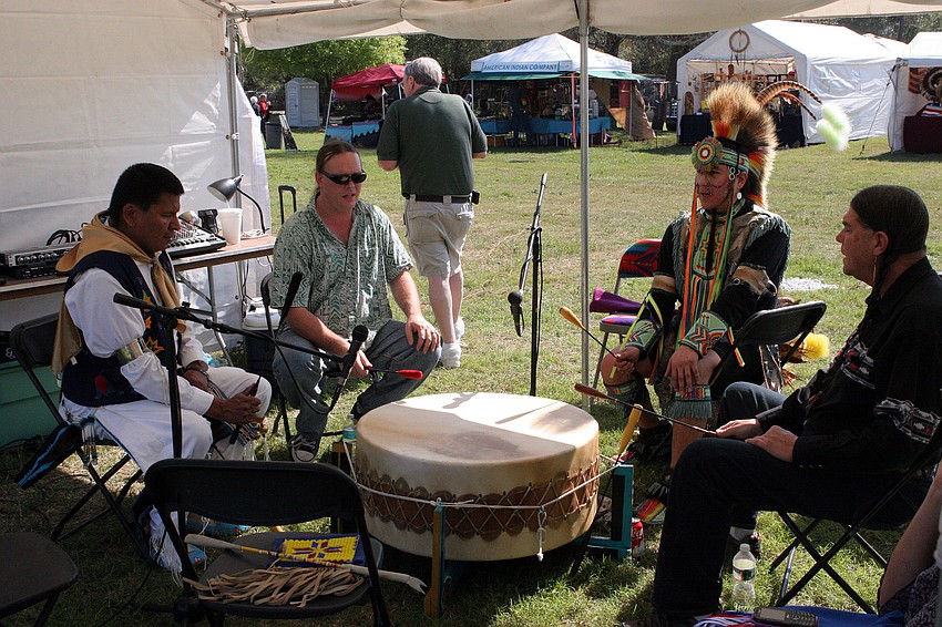 Southern Horse plays the drum for the dancers.