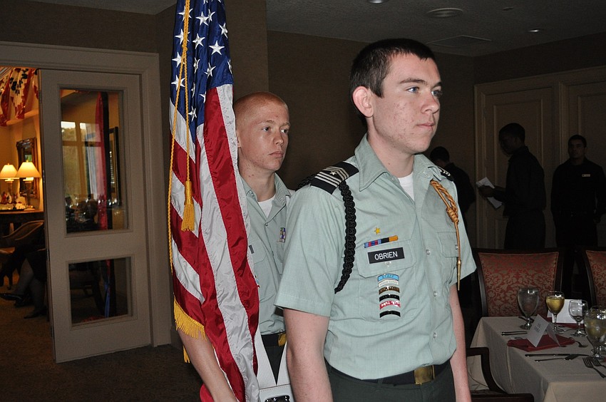 Corey Bergstrom and Patrick Oâ€™Brien of the Lakewood Ranch High School JROTC Color Guard presented the colors for the Pledge of Allegiance.