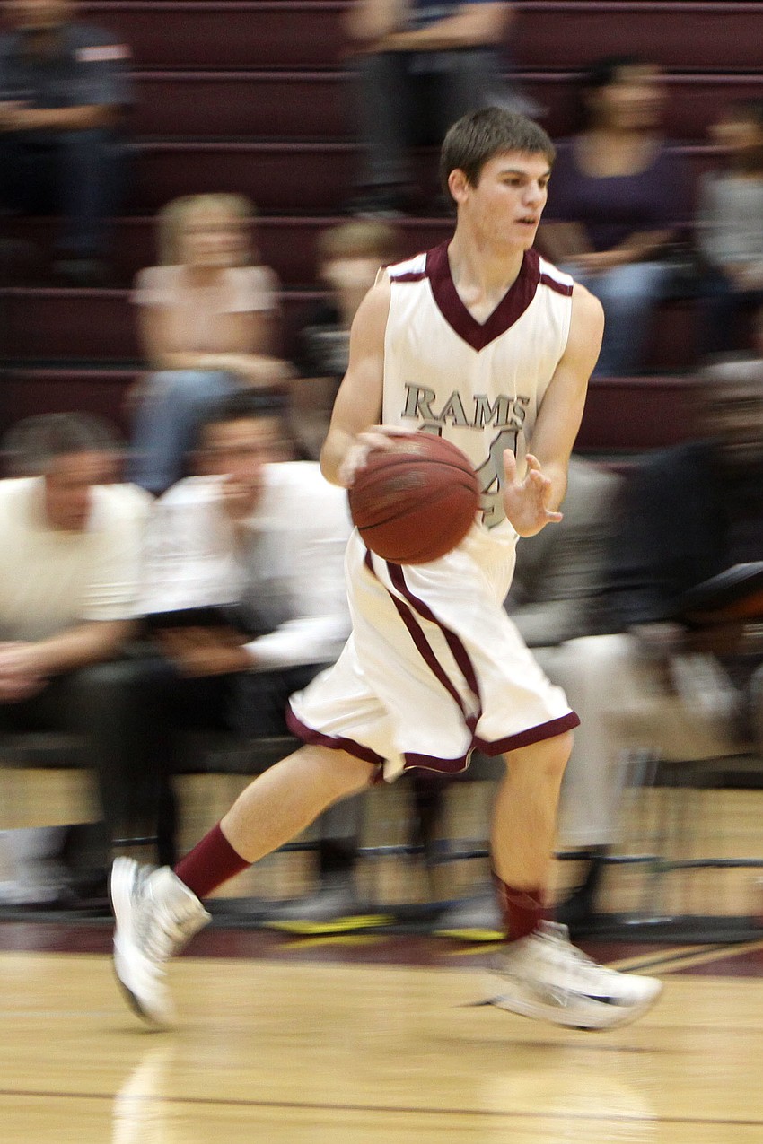 Riverviewâ€™s Vic Sinopoli, No. 14, dribbles the ball down the court.