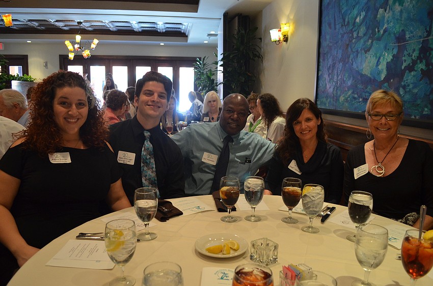 Kristina Grainger with her husband Kevin, Les Dennard with his wife Sheri, and Rebecca Ronan