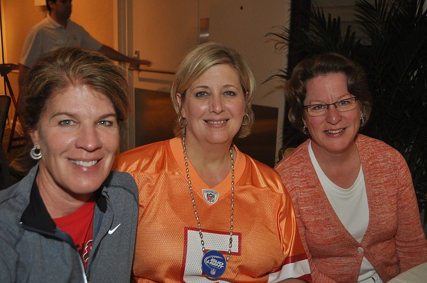 Julie Skinner, Debbie Thomas and Deb Larson at the Longboat Key Club Super Bowl party.