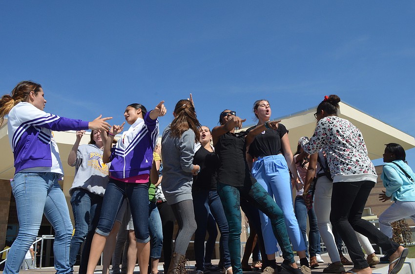 Students sang along to pop sings and danced in front of their peers during the Renaissance Rally.
