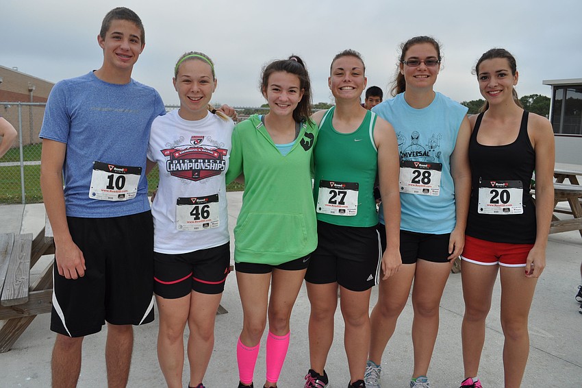 Kyle Buser, Kelsey Saalmann, Mary Stager, Maddie Labrecque, Megan Labrecque and Emmanuelle Couilliet are members of the track team.