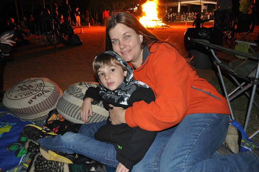 Sammy and Wendy Miller. Sammy, 7, lost his first tooth before the event.