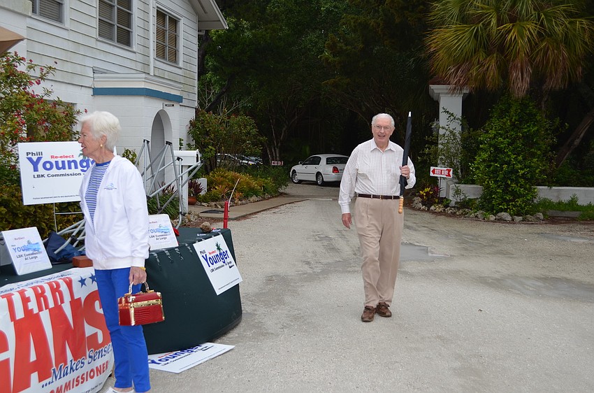 Key voters take advantage of a break in the rain Tuesday to cast a ballot at Longboat Island Chapel.