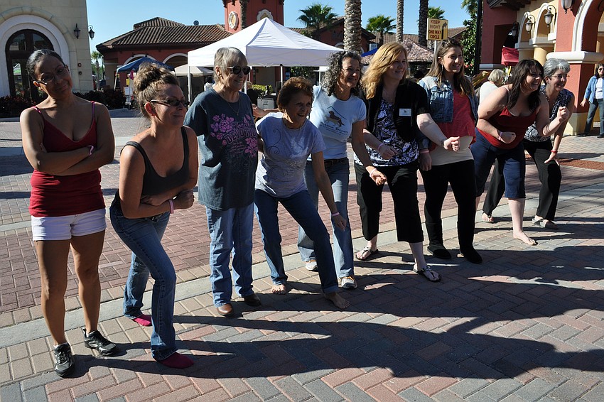 Participants in the Run for Their Lives fundraiser readied to put on as many clothes as they could in five minutes.